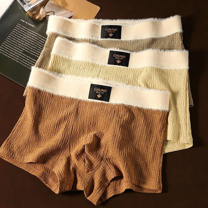 🩲Ropa interior de felpa cálida de color sólido transpirable para hombre.